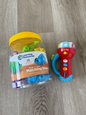 Learning resources dinosaurs and vtech flashlight bundle of toys
